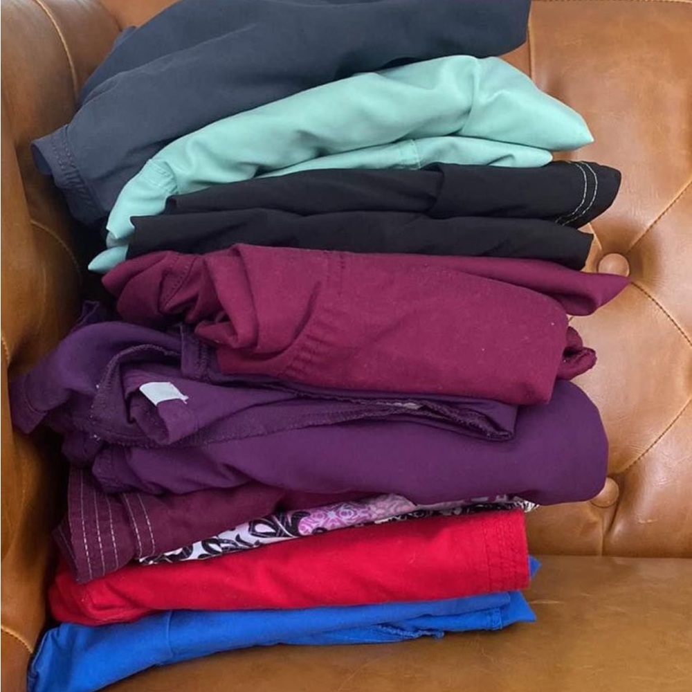 8 pairs of scrubs, some flare pants some joggers